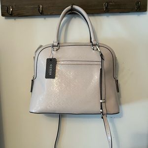 Guess purse. New with tag. Light Pink